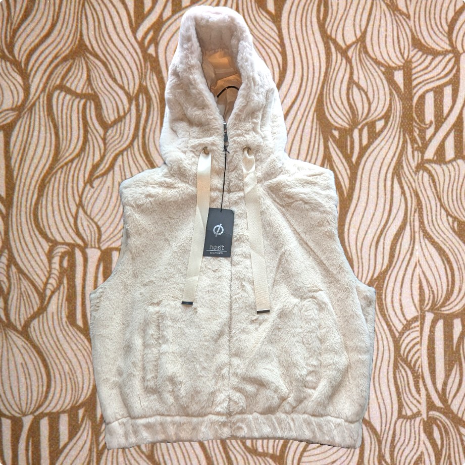 Veste sans manche en fausse fourrure blanche